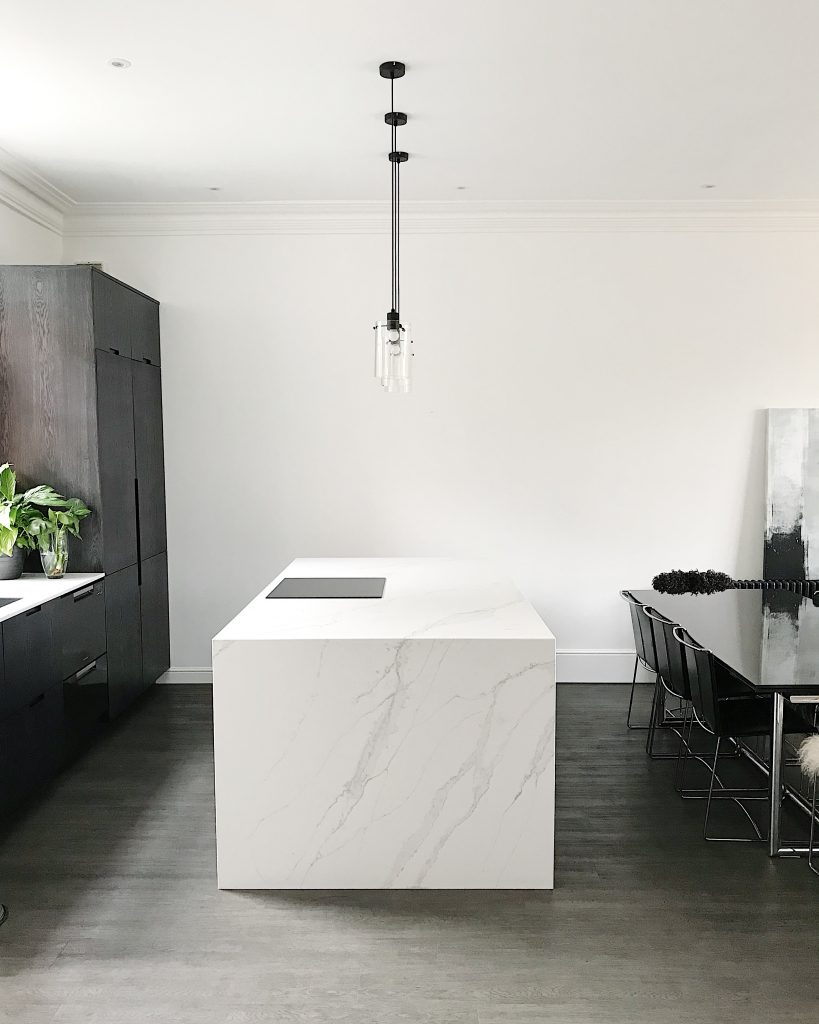 Kitchen island with Unique Calacatta.